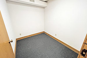 Uptown Plaza, Suite 111, private office number two is two neighboring offices. Offers carpeted flooring.