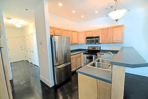 The Kirkwood, Uptown Senate, kitchen comes with stainless steal appliances.