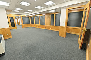 Fountain Square, Suite 232, spacious private office with multiple windows.