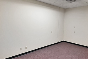 Fulton Square, Suite 113, offers a spacious storefront with a private office.
