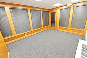 This spacious office provides multiple windows.