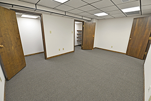 Graham Plaza, Suite 013, Private Office with two storage rooms.