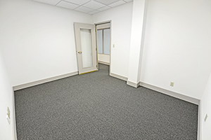 Shower, Suite 121, office 1 is spacious and is located near the conference room.