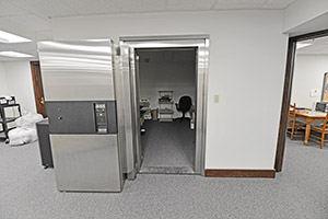 Fountain Square, Suite 030, provides a large safe for storing valuables. An enormously thick, steel door is open.