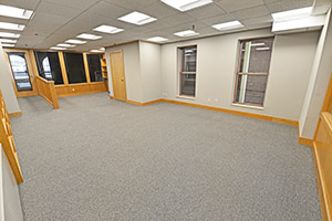Fountain Square, Suite 307, spacious collaborative space with windows and LED lighting..