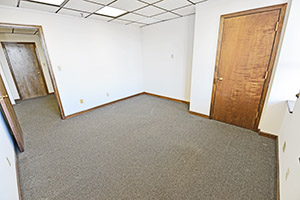 Graham Plaza, Suite 512, second private office offers windows with natural light and a storage closet.
