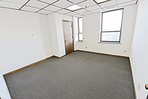 Graham Plaza, Suite 512, second private office offers windows with natural light and a storage closet.