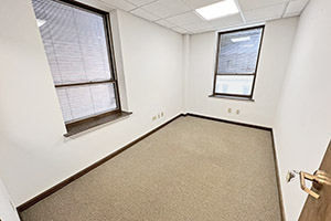 Graham Plaza, suite 450, second office offers two windows for natural light. This office can be accessed through the reception area.