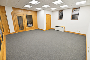 Fountain Square, Suite 247, offers a spacious open floor plan with multiple windows and LED lights.
